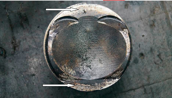 Фото 23. На днище поршня 1-го цилиндра имеются повреждения в виде множественных точечных смятий металла