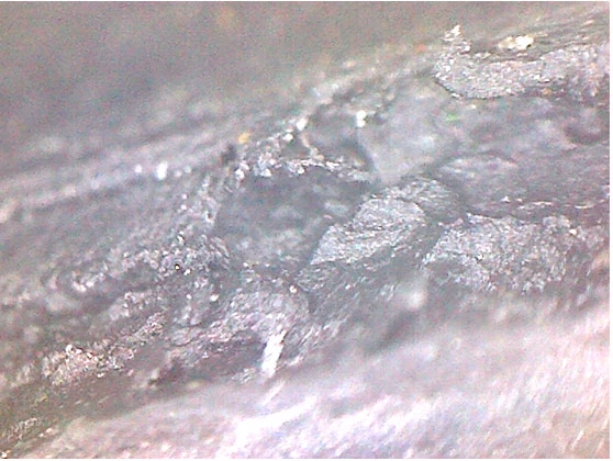 Фото 5. Разъедания резины прокладки теплообменника на верхней кромке (увеличение 20,8х)