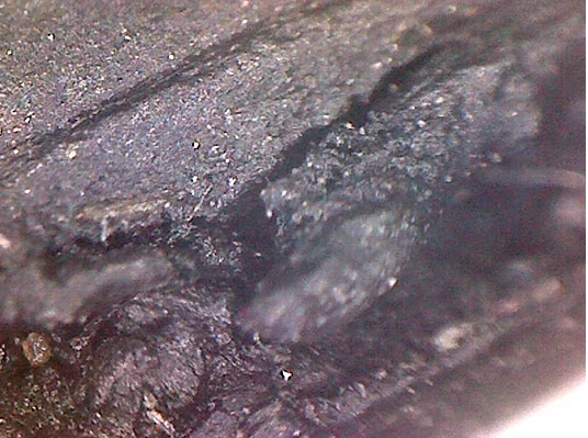 Фото 6. Разъедания резины прокладки теплообменника на верхней кромке (увеличение 20,8х)