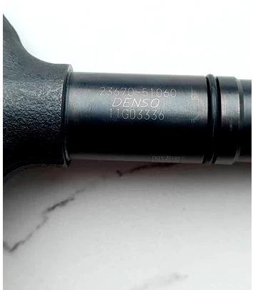 Фото 2. Марка и номера форсунки