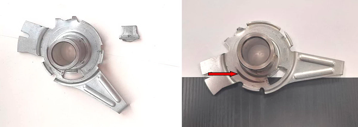 Фото 9,10. Повреждение упорной части кронштейна ролика с разрушенным фрагментом и след черного цвета – показан красной стрелкой
