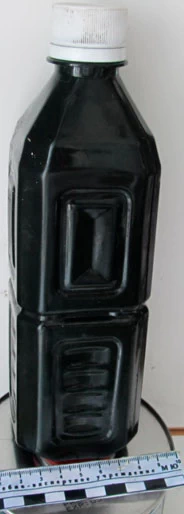 Фото 1. Внешний вид бутылки с образцом моторного масла представленного на исследование.