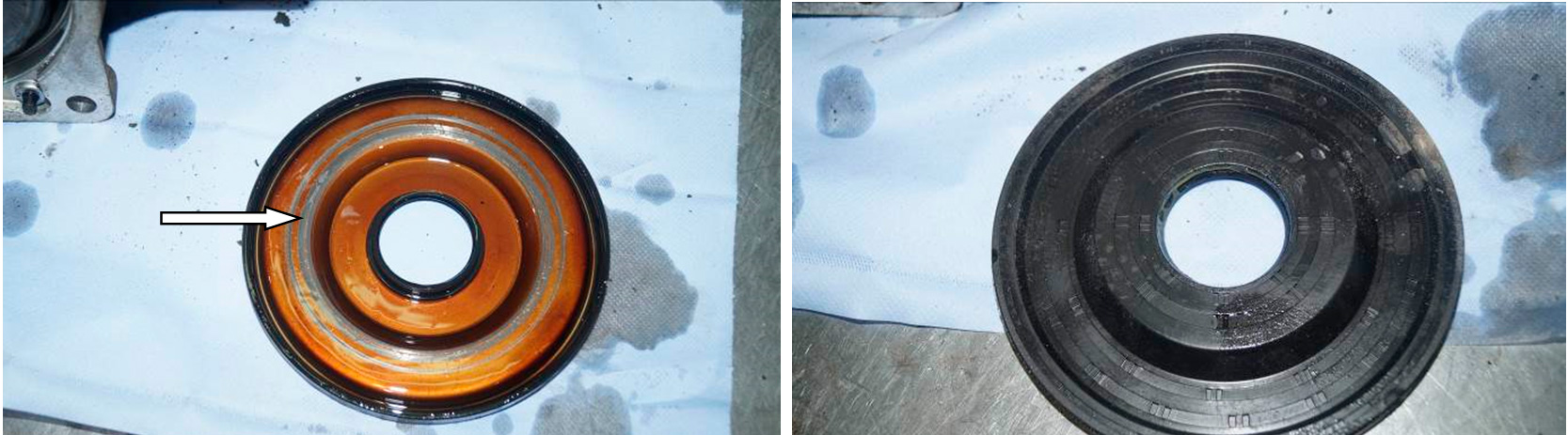 Фото 8,9. Сальник (заглушка) муфты включения (стрелкой показан след от контактного взаимодействия)