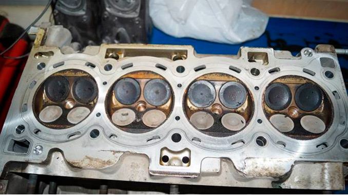 Фото 31. Головка блока цилиндров	
